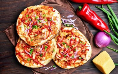 High-Protein Butter Chicken Naan Pizza